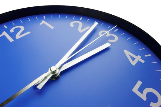 Blue clock face on white photo
