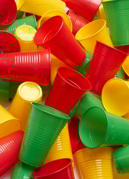 Plastic colored cup closeup photo