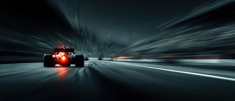 Fast car racing at night on a blurred track photo