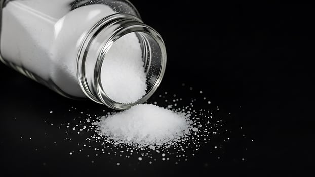 Sodium chloride is a salt that is used in many foods photo
