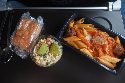 Meal served on a plane during a business trip photo