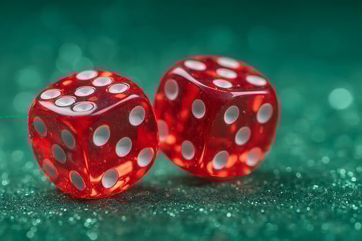Red Transparent Dice on Green Glitter Background photo