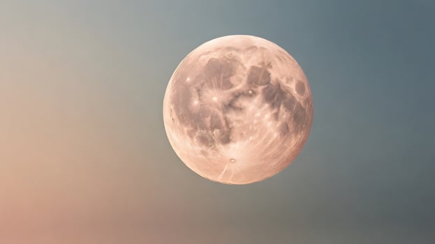 Full Moon Glowing in the Sky with a Pinkish Hue and Texture photo