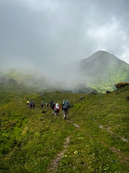 Spectacular group hike in the mountains photo