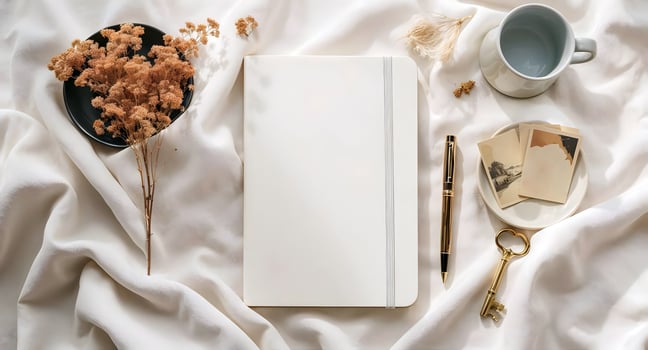 Elegant Flat Lay with Diary Pen Vintage Key and Nostalgic Photographs on Neutral Table, Minimal Aesthetic Workspace background photo