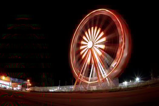 A ferris wheel at night photo