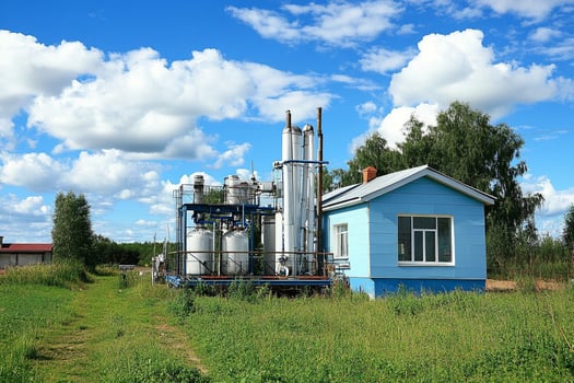 A blue house with a blue roof and a blue fence photo