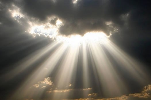Sunbeams through the clouds photo