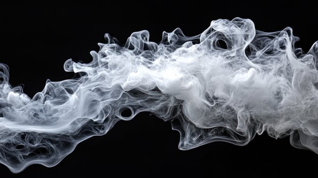 Abstract smoke swirls against black photo