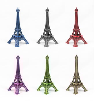 Six multicolored Eiffel Tower models, isolated on white background photo