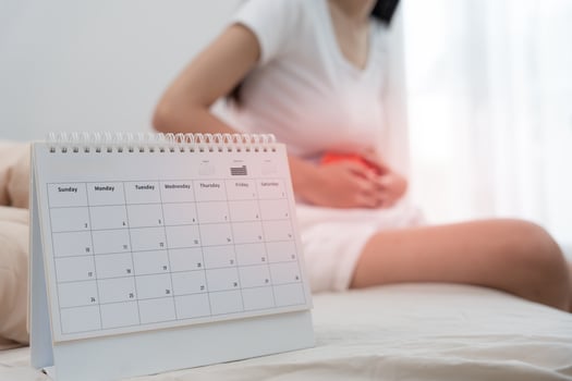 stomach ache., Asian women have abdominal pain, indigestion, gastritis, menstrual cramps, flatulence, diarrhea, distention, colon cancer, belly inflammation problem, suffer food poisoning, abdomen photo