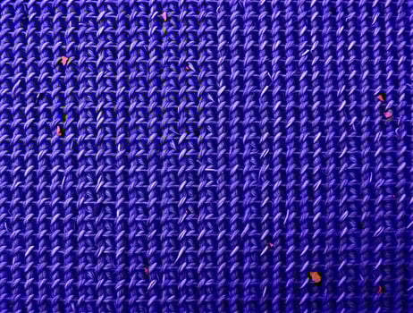 Vibrant Purple Knit Texture CloseUp Detailed Fabric Background for Design Projects photo