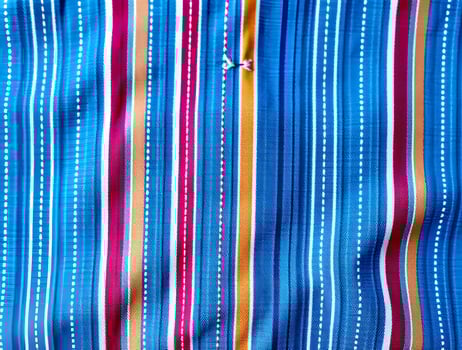 Vibrant Striped Fabric Texture Blue Pink Orange White Vertical Lines Textile Design Element photo