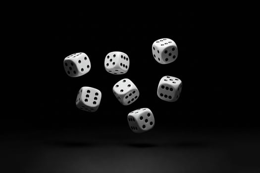 Falling game dice on a black background. Gambling concept. photo