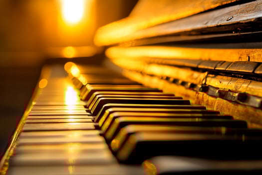 A close up of a piano keyboard at sunset photo