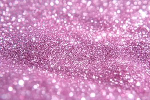 A close up of a pink glittery surface photo