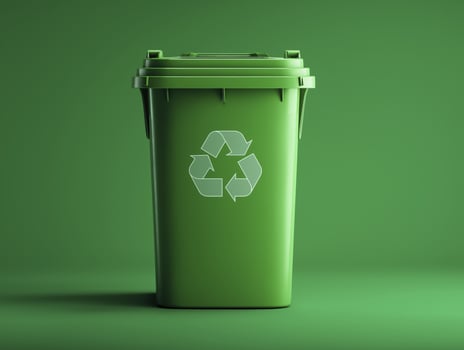 a Green recycling bin with recycling symbolnt photo