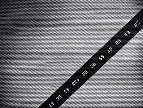 Textured Fabric Background with Numbered Diagonal Band photo