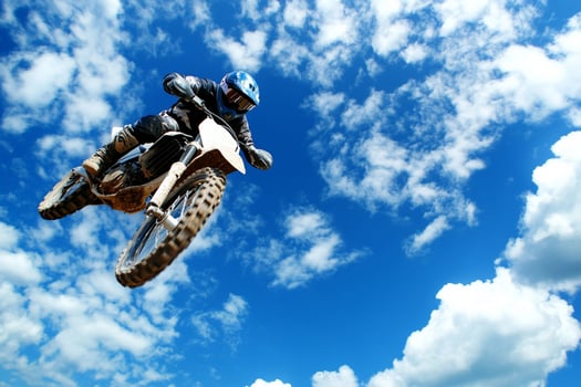 A person on a dirt bike in the air photo