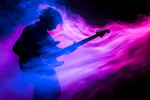 A person playing an electric guitar in smoke photo