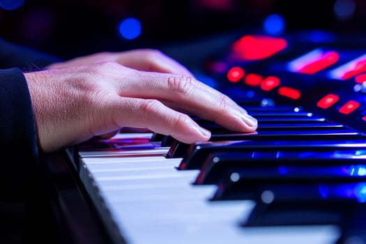 A person playing a keyboard photo
