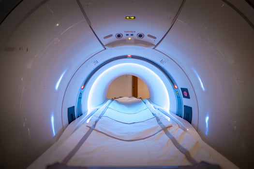 Inside view of ct scanner machine with patient table, modern medical imaging technology for diagnostics photo