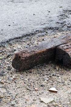 Old coconut wood plank showing dark detailed grain and fibers photo