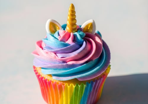 Unicorn Cupcake with Glittery Icing and Miniature Horn photo