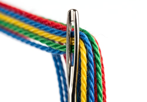 Threads Through a Needle - Precision and Unity in Collaboration photo