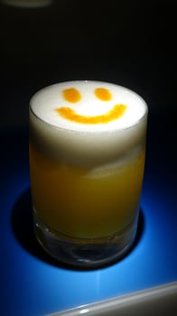 Refreshing Drink with a Happy Smiley Face Design. photo