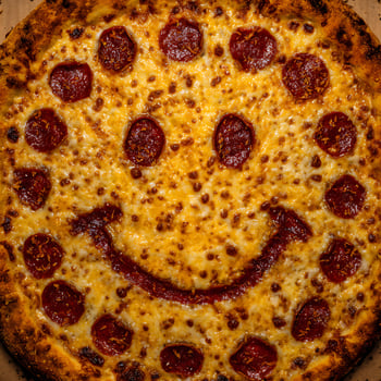 A Happy Pepperoni Pizza Face to Brighten Your Day. photo