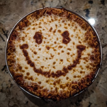 Smiley Face Pizza Melted Cheese Delicious Comfort Food Snack. photo