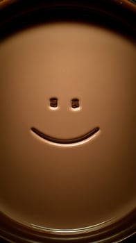 Smiley Face Melts into Delicious Chocolate Drink, Pure Joy. photo