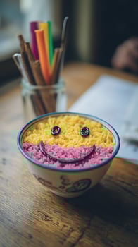 Joyful food art a smiley face made from colorful rice in a bowl. photo
