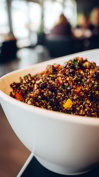 Healthy and Colorful Quinoa Salad in a White Bowl. photo