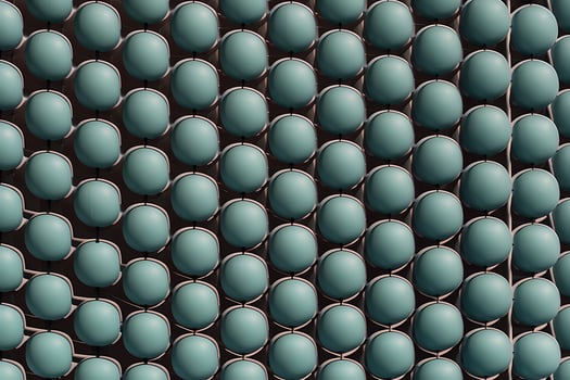 Teal Spheres Arranged in a Grid Pattern with Subtle Lighting background abstract photo