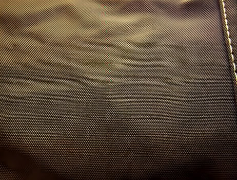 CloseUp View of Brown Textured Fabric A Detailed Look at Woven Material photo