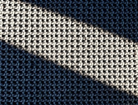 Textured Fabric Contrasting Light and Shadow on Woven Material photo