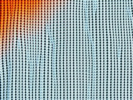 Stunning Knit Texture Abstract Blue and Orange Fabric Background photo