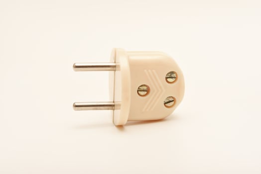 Foldable Carbolite fork. An uncommon electric plug. photo