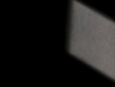 Dramatic Diagonal Light on Textured Surface Abstract Dark Background photo