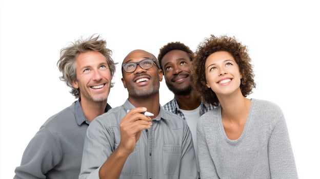 Diverse multicultural group looking upward with hopeful expressions showing optimism and unity photo