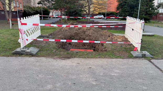 Construction Area Marked with Warning Barriers in the Park To Ensure Safety and Caution photo