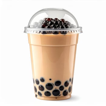 Pearl Milk Tea Boba Drink with Tapioca Balls in a Clear Plastic Cup on White photo