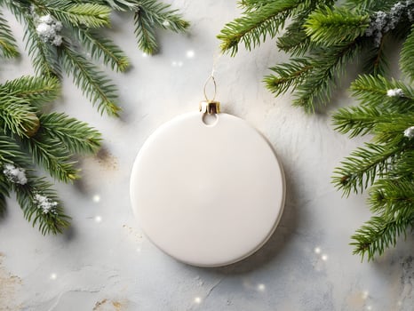 Blank White Round Christmas Ornament Mockup with Fir Branches photo