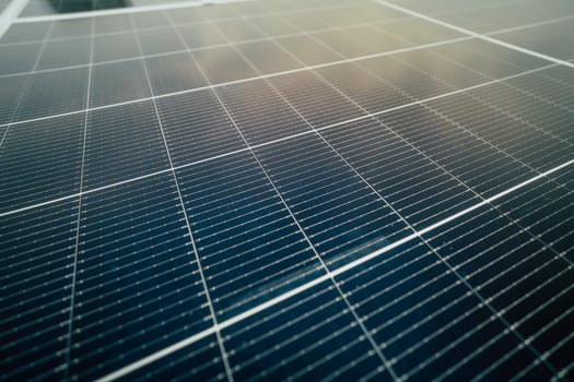 Innovative solar panels capture sunlight efficiently on a clear day in a modern urban setting photo