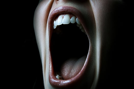 A woman with her mouth open photo