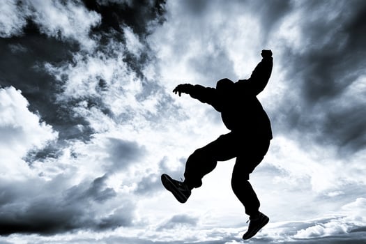 A person jumping in the air photo