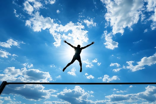 A man jumping over a high bar in the sky photo