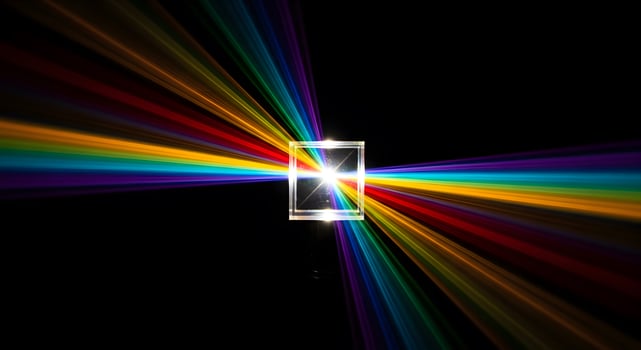 Stunning prism refracts light into vibrant rainbow spectrum, showcasing science and color theory beautifully photo
